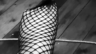 Teen in fishnet socks