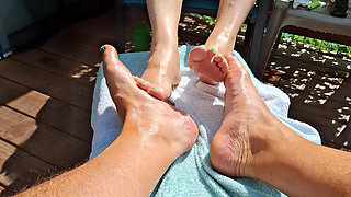 Massage oil on our feet for us while we relax