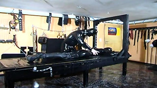 Bdsm with masked girl in latex