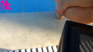 Barefoot Dangling in Swimming Pool Water
