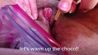 eating chocolate snacks warmed by my pussy!