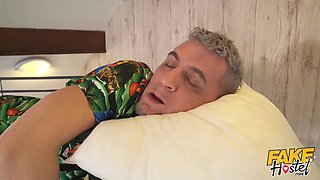 Faux hostel - surprise crevasse in couch makes chubby chick grin