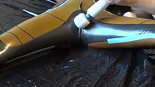 Latex Danielle is attached to the bed and masturbated with the massage vibrator