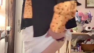 In an outfit with a little white skirt to get me caught by a dildo