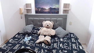 Horny Latina masturbates showing her tits.