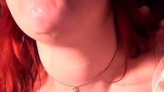 Curvy Redhead Gives a Black Dildo a Sloppy Blowjob