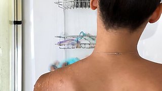 Busty curly brunette with big boobs fucks on couch