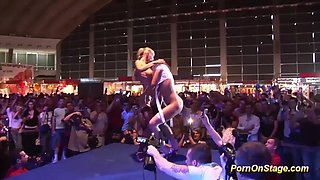 extreme hot babes in sexy babes uniform kissing and licking on public sexfair show stage