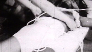Black-and-white Vintage Bondage Classic with Rope-bound Retro Submissives