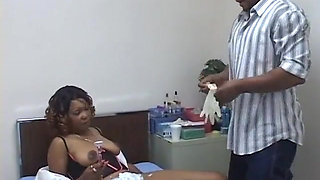 Watch the black chick shave her hairy pussy