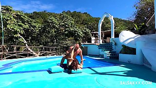 Tattooed Latina getting freaky by the pool