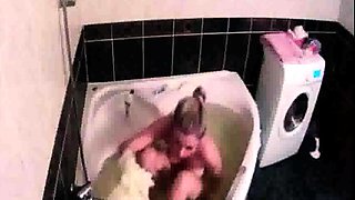 Peeking at stepdaughter Amy shaving in the bath