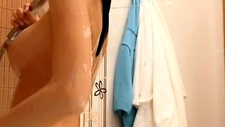 Busty curly brunette with big boobs fucks on couch