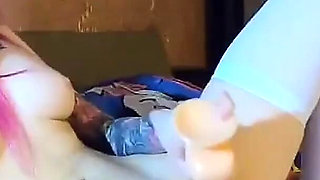 Girl puts a dildo in a tight pussy