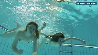 Two super hot teens in the pool