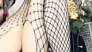 Big tit shemale jerks her long cock