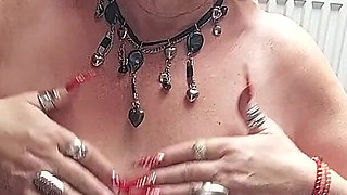 Busty Mature Slut Squeezes Massive Tits Moaning in Heels