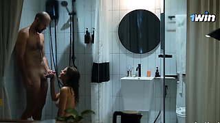 Hot fledgling couple showers together to clean spunk from