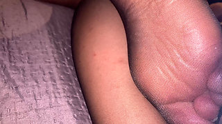 Feet in black pantyhose to jerk off and cum