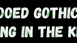 Tattooed gothic lady smoking in the kitchen