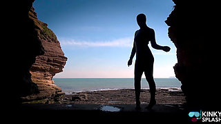 Shiny Rubber Wetsuit Tease in Private Cave
