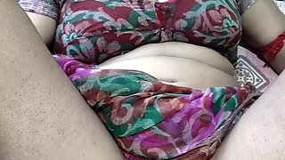 Sister-in-law sat on the chair and rubbed her black pussy in red tights and removed all the water