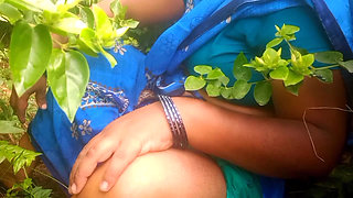 Beautiful boobs of the aunty who works in the garden