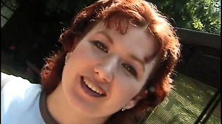 Redhead MILF with small tits rides a hard cock by the pool