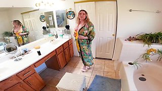 The blonde woman is on her knees and ready to suck