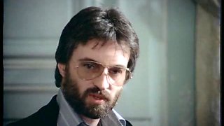 Posh blonde lady gives her clothed man a quick blowjob