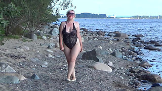 Teasing and Rinsing Her Pussy in the Lake.
