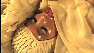 Big boobed Memphis masturbates in a bodystocking