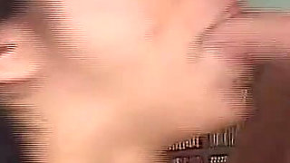 Two Cocks in Her Throat and She Swallows Like a Candy