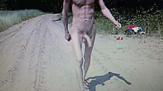 Naked skinny huge hung guy with hard on outside